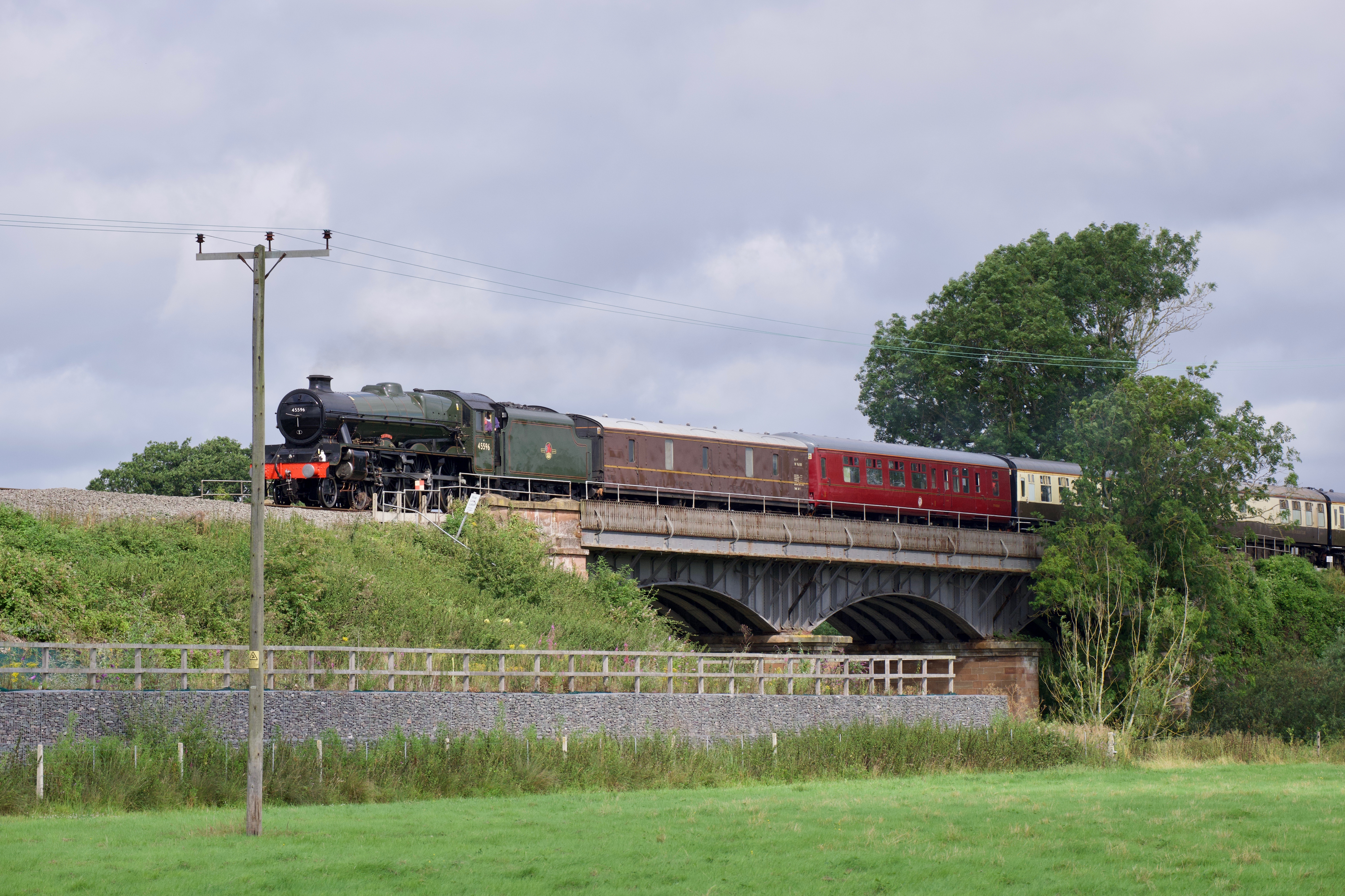 Composition is poor on this one as the engine is too close to the telegraph pole.